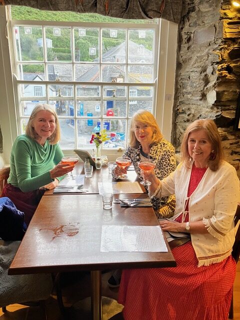 Writers raising their glasses